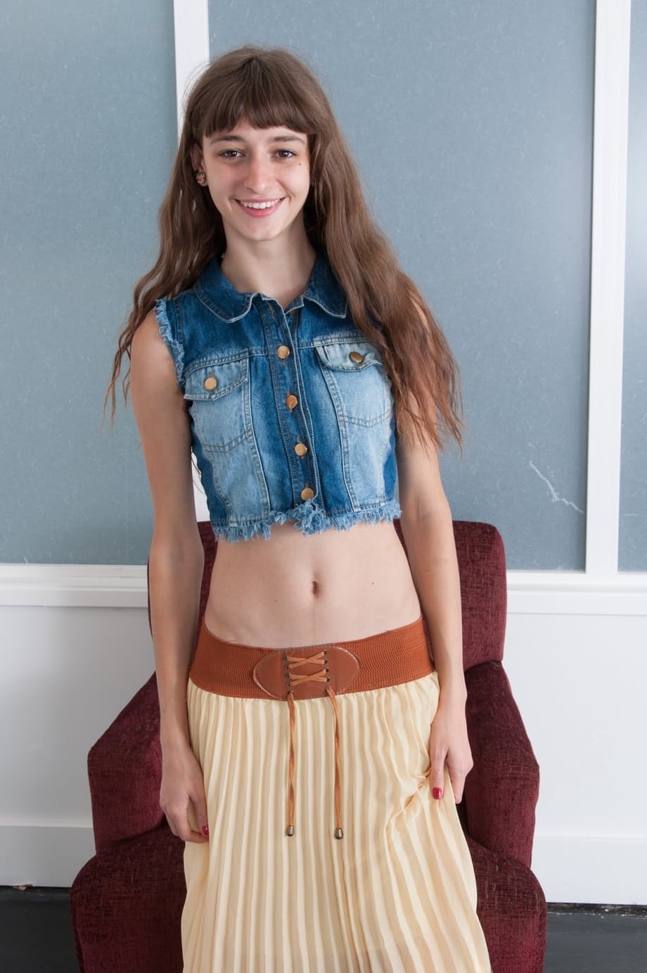 Thin teen girl undresses to put her unshaven body on display