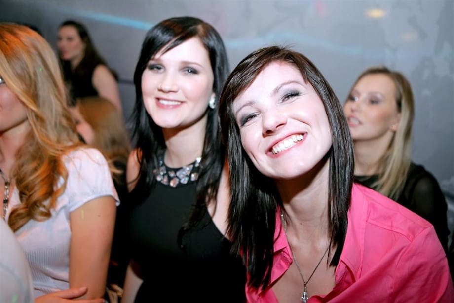 Club going girls lose their clothes while blowing male dancers