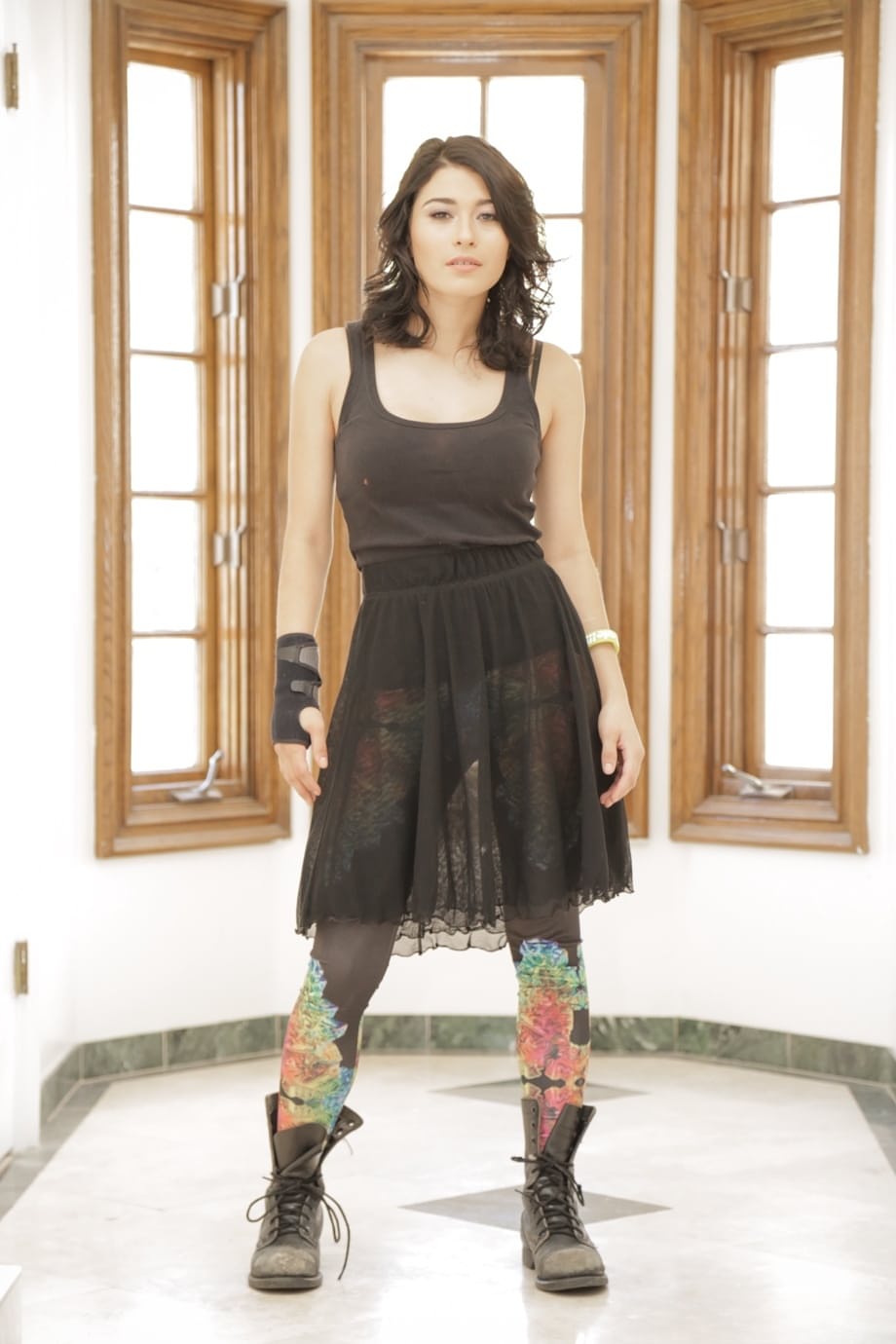 Punk girl Raven Rockette stands naked in well used boots after a striptease