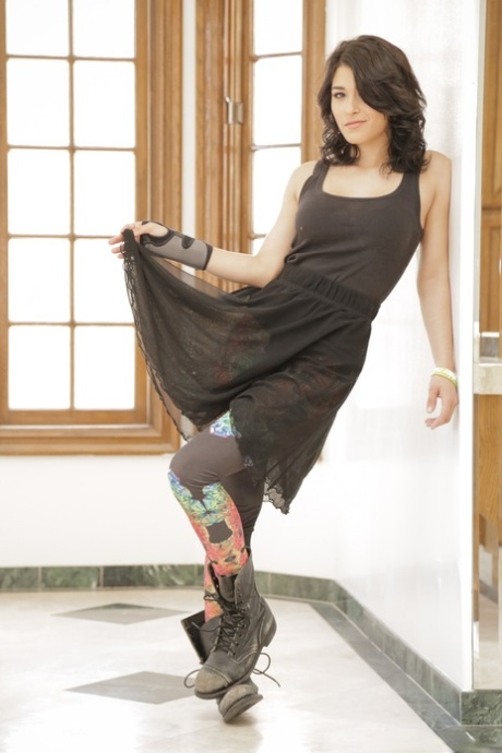Punk girl Raven Rockette stands naked in well used boots after a striptease