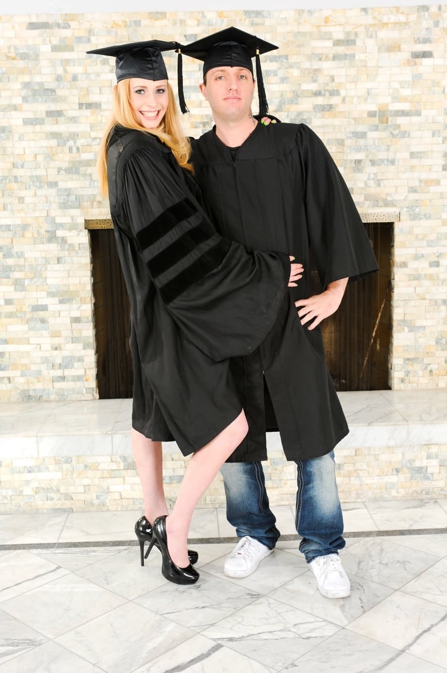 Blonde grad in heels spreads to flash nude upskirt in interracial group grope