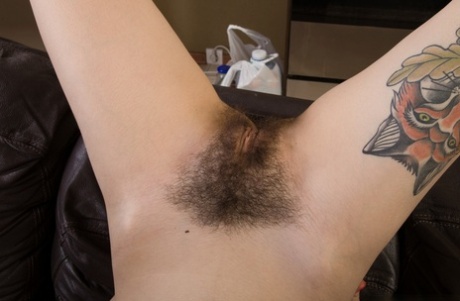 Nerdy amateur Anni Bay removes her mesh pantyhose to expose her beaver