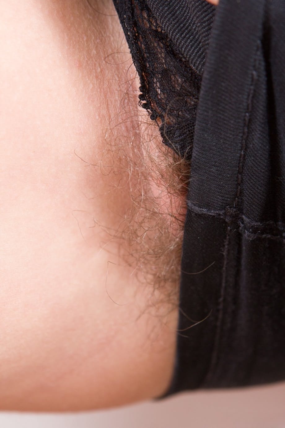Young brunette teen Mary K reveals her very hairy pussy for an extreme closeup