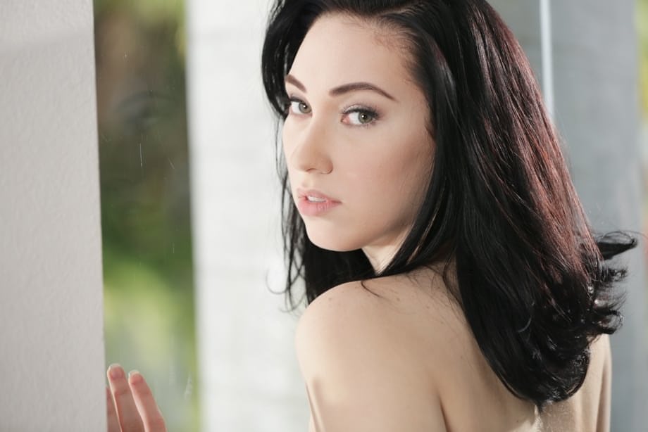 Latina model Aria Alexander peels off leather pants on way to nude posing