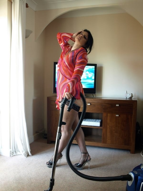 Fat mature wife gets turned on and plays with the vacuum cleaner