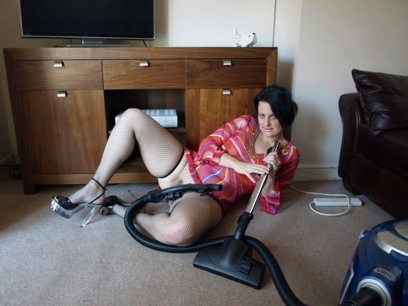 Fat mature wife gets turned on and plays with the vacuum cleaner