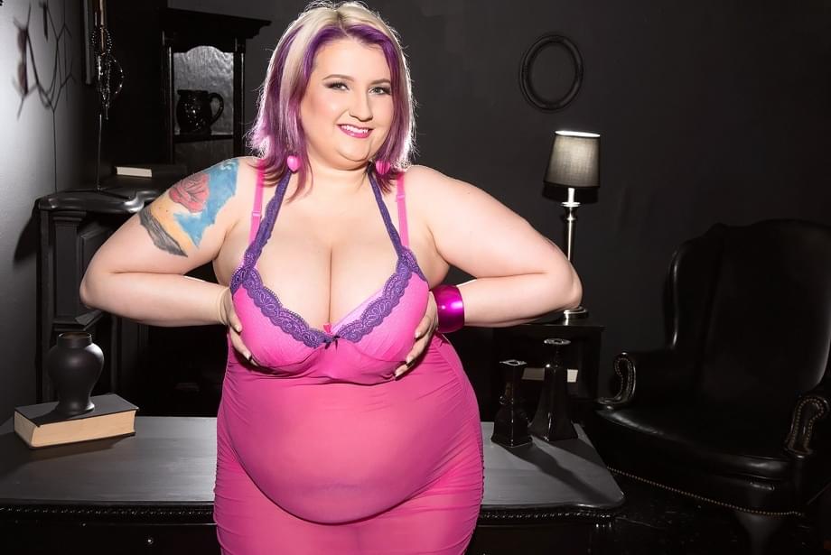 Obese female Porsche Dali releases her saggy boobs from sheer attire and bra