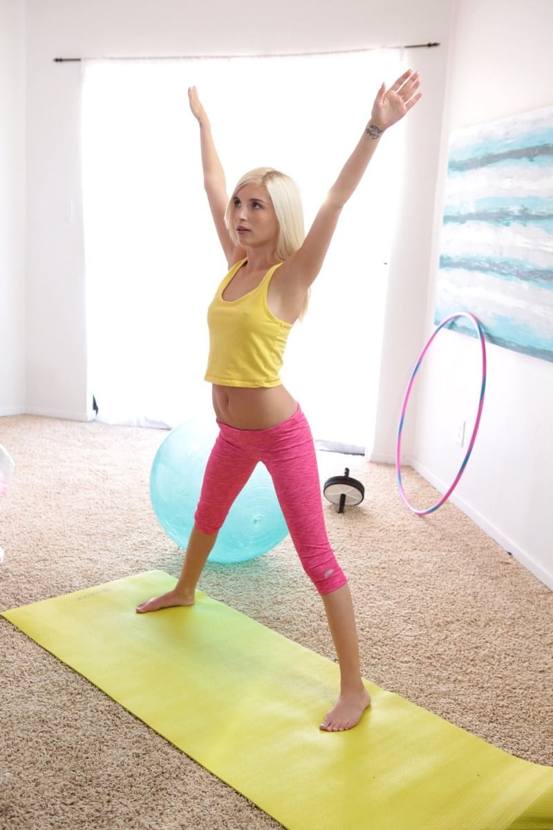 Flexible young yogi Piper Perri shows off her agility skills with a big cock