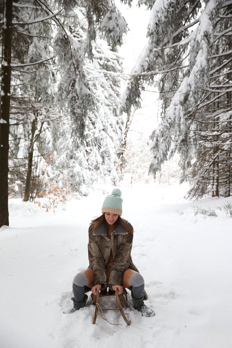 Fully clothed cute girl Clover posing in socks & flaunting bare ass outdoors