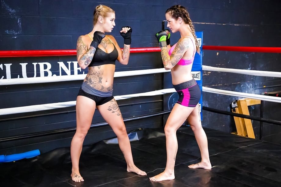 Female kick boxers settle their bout with lesbian sex in boxing ring