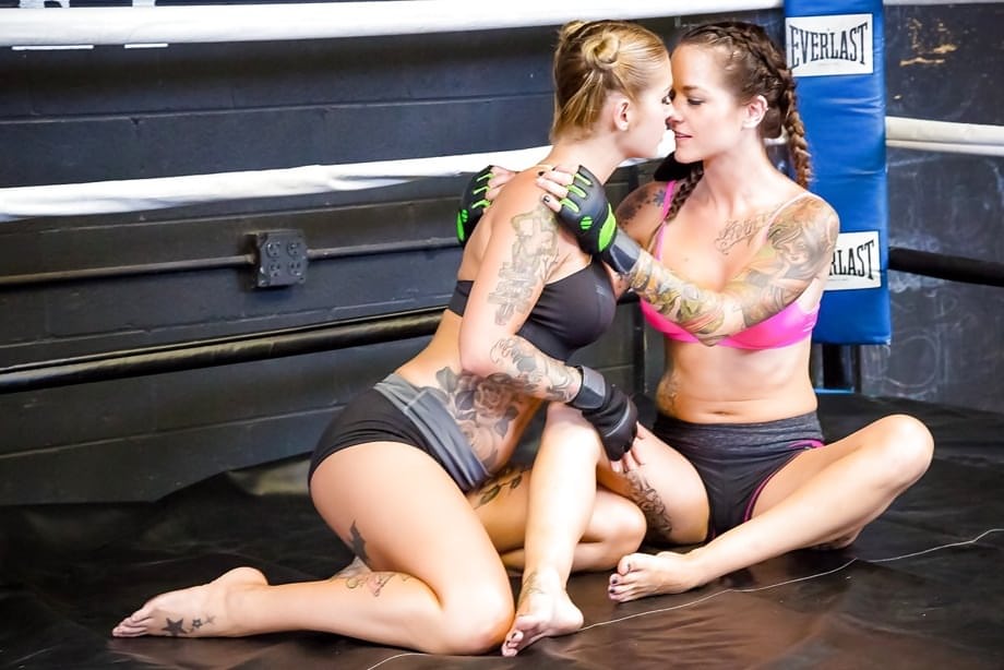 Female kick boxers settle their bout with lesbian sex in boxing ring