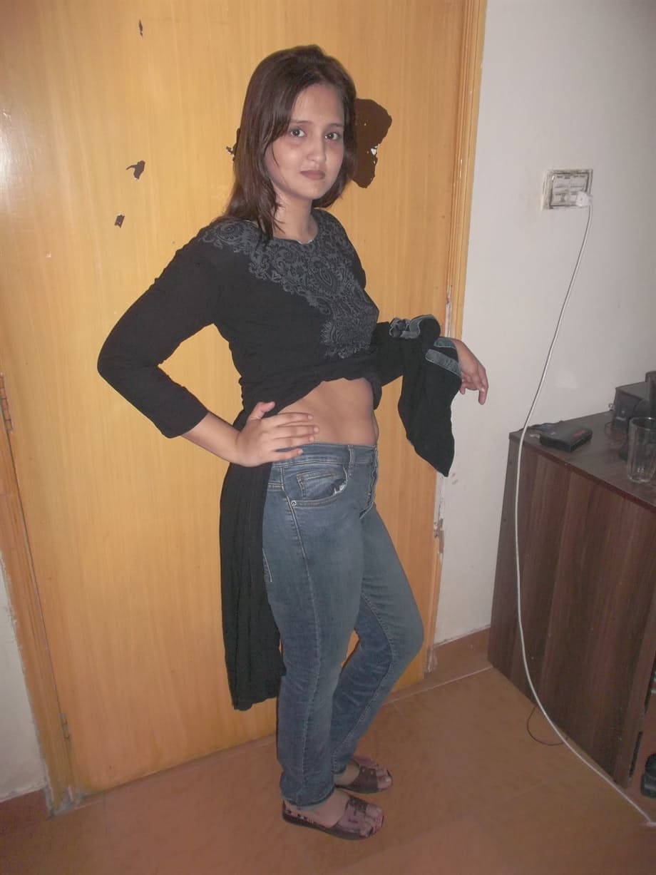 Hot Indian model in tight jeans posing seductively in sexy lace bra