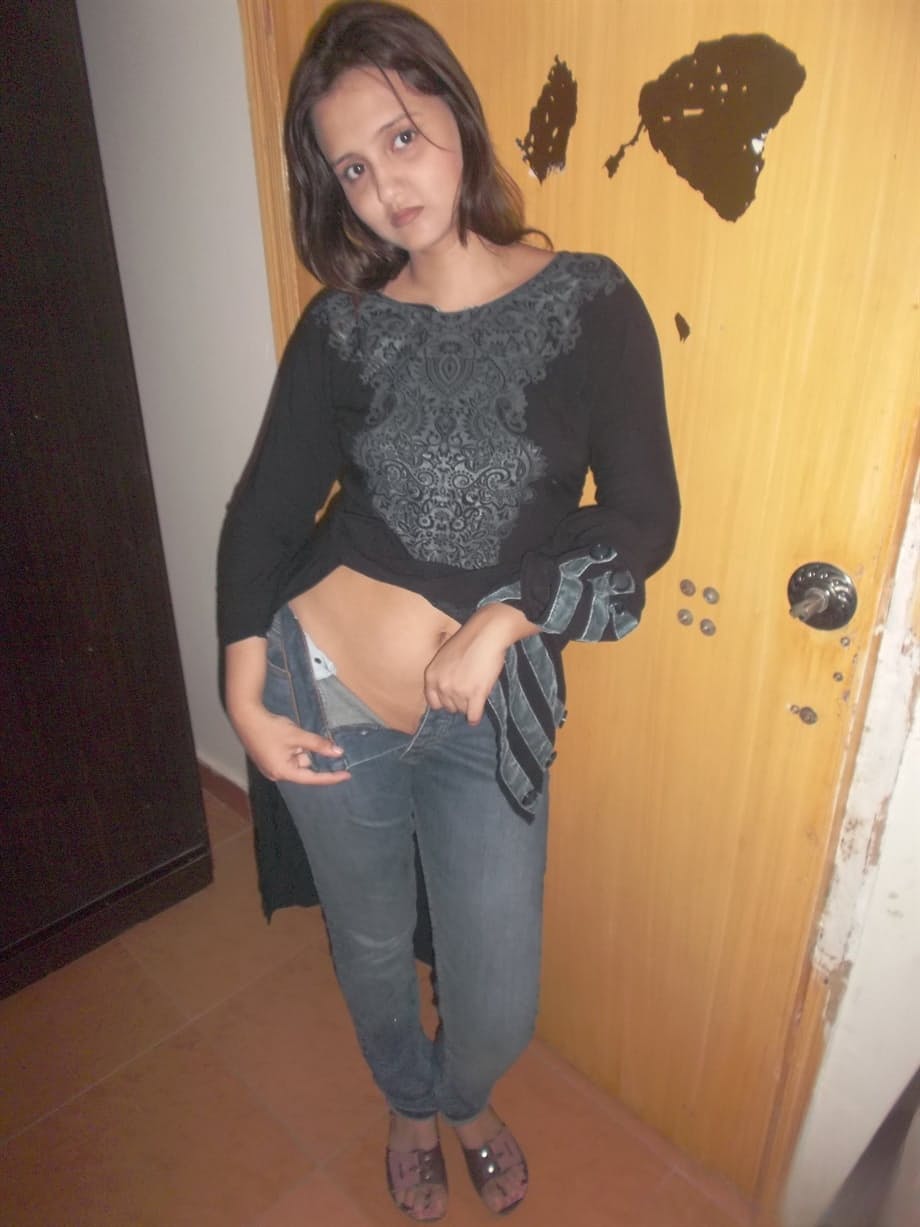 Hot Indian model in tight jeans posing seductively in sexy lace bra