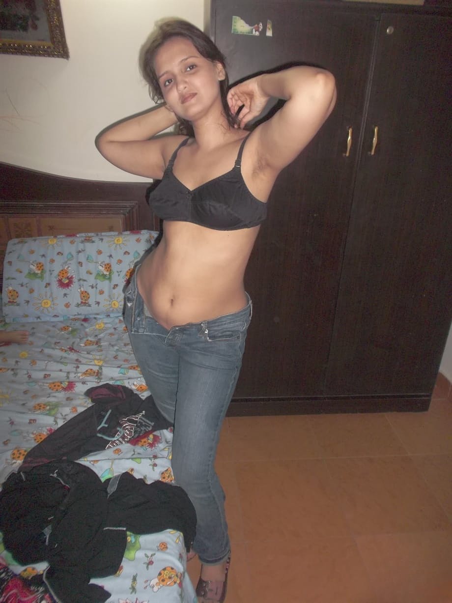 Hot Indian model in tight jeans posing seductively in sexy lace bra