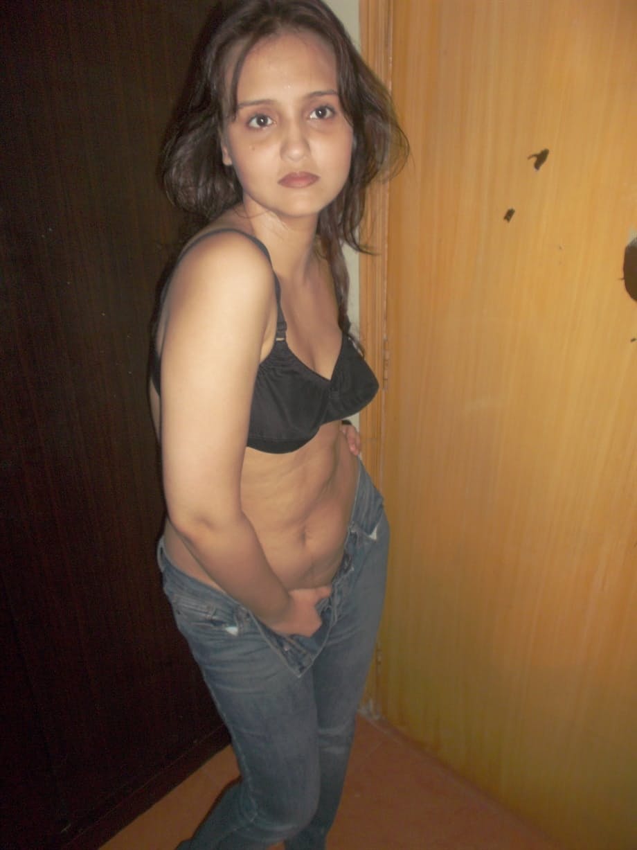 Hot Indian model in tight jeans posing seductively in sexy lace bra