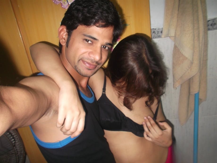 Desi female with small tits prepares to go down on her husband