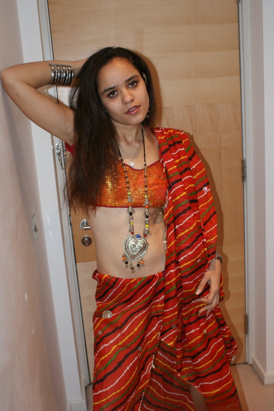 Indian princess Jasime takes her traditional clothes and poses nude