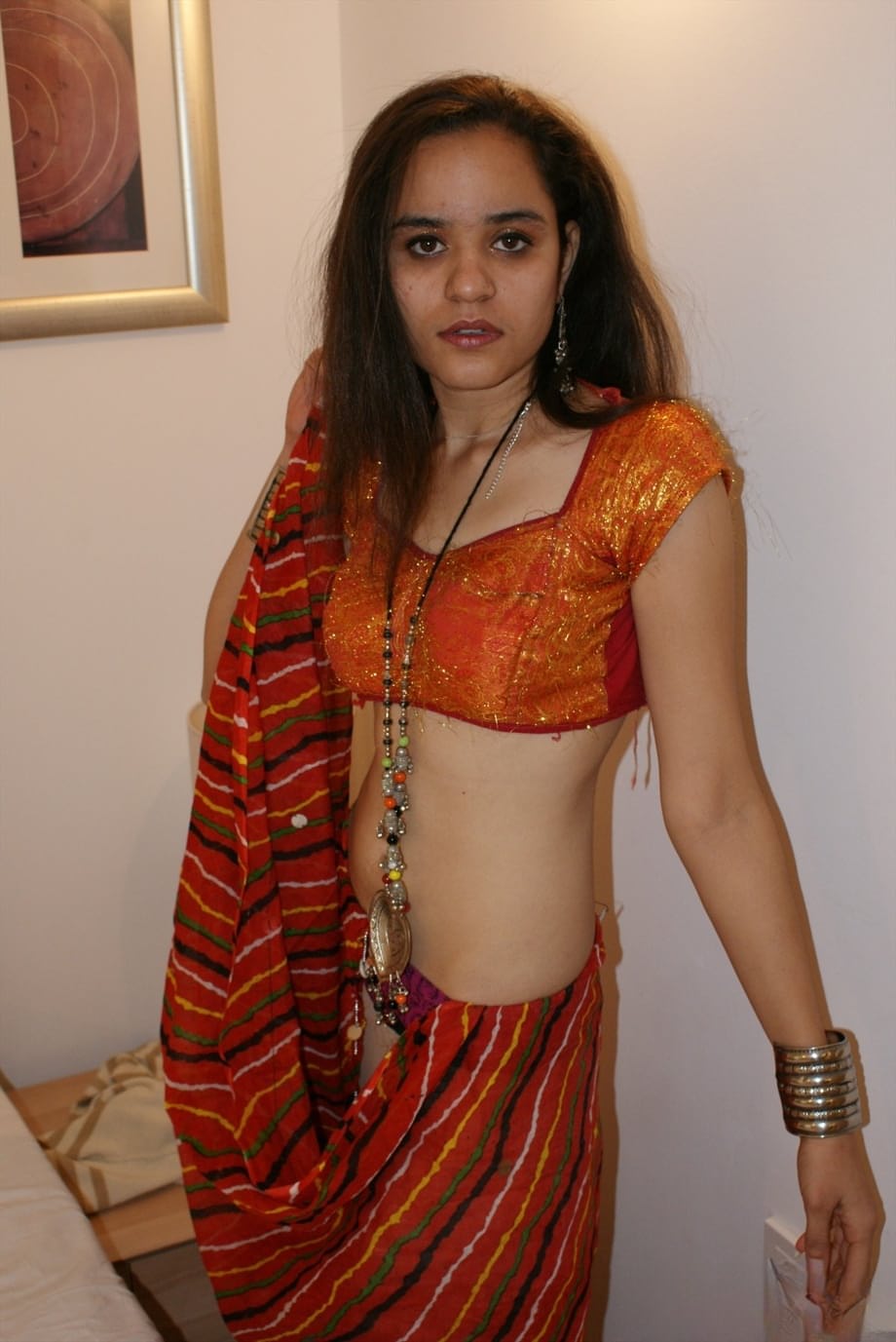 Indian princess Jasime takes her traditional clothes and poses nude