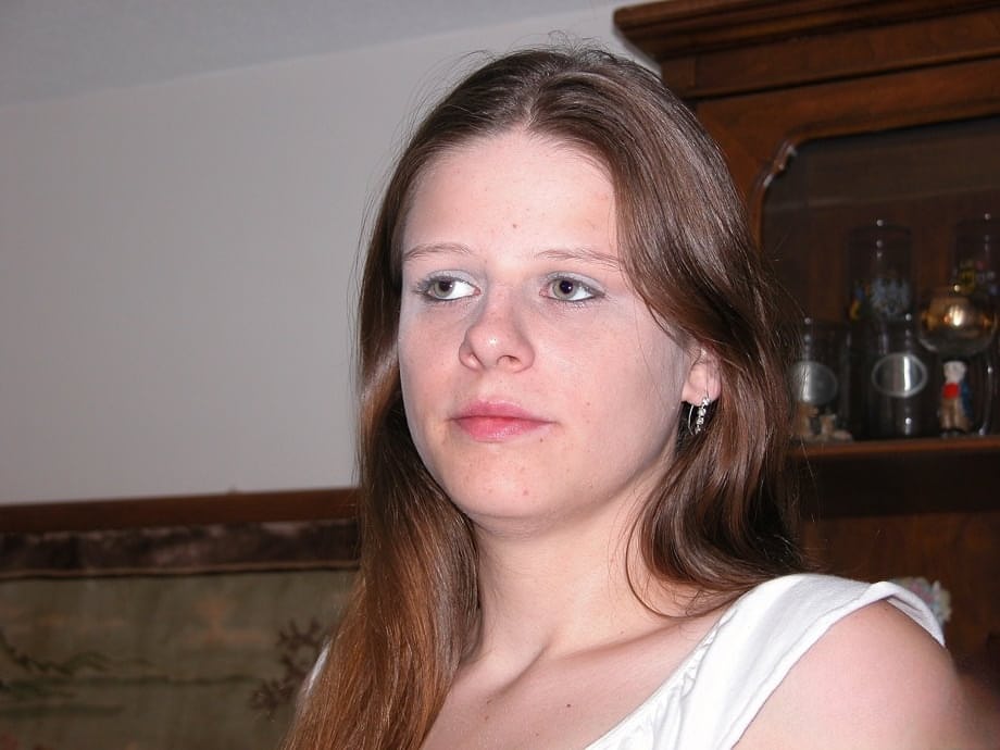 Plain amateur girl poses in kitchen naked showing tiny saggy tits & hairy ass