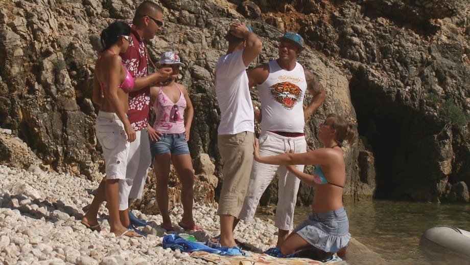 A day at a nude beach turns into a day of group sex fucking under the hot sun