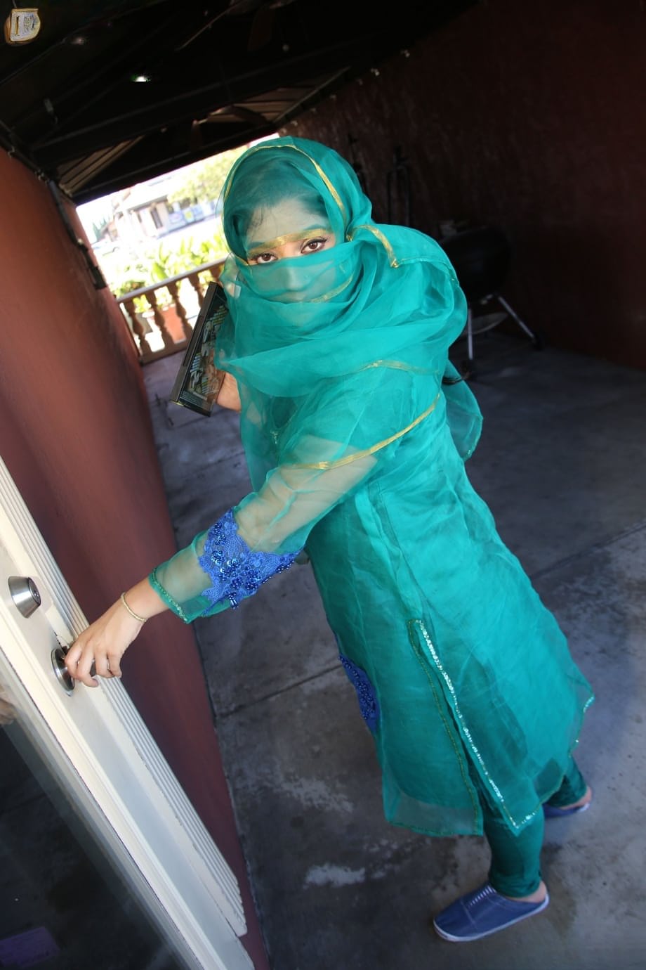 Clothed Indian Nadia Ali gets naked after finding a BBC poking thru gloryhole