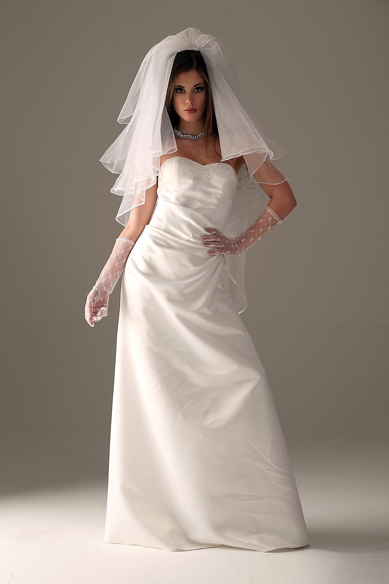 Glamour model Little Caprice strips off her wedding dress