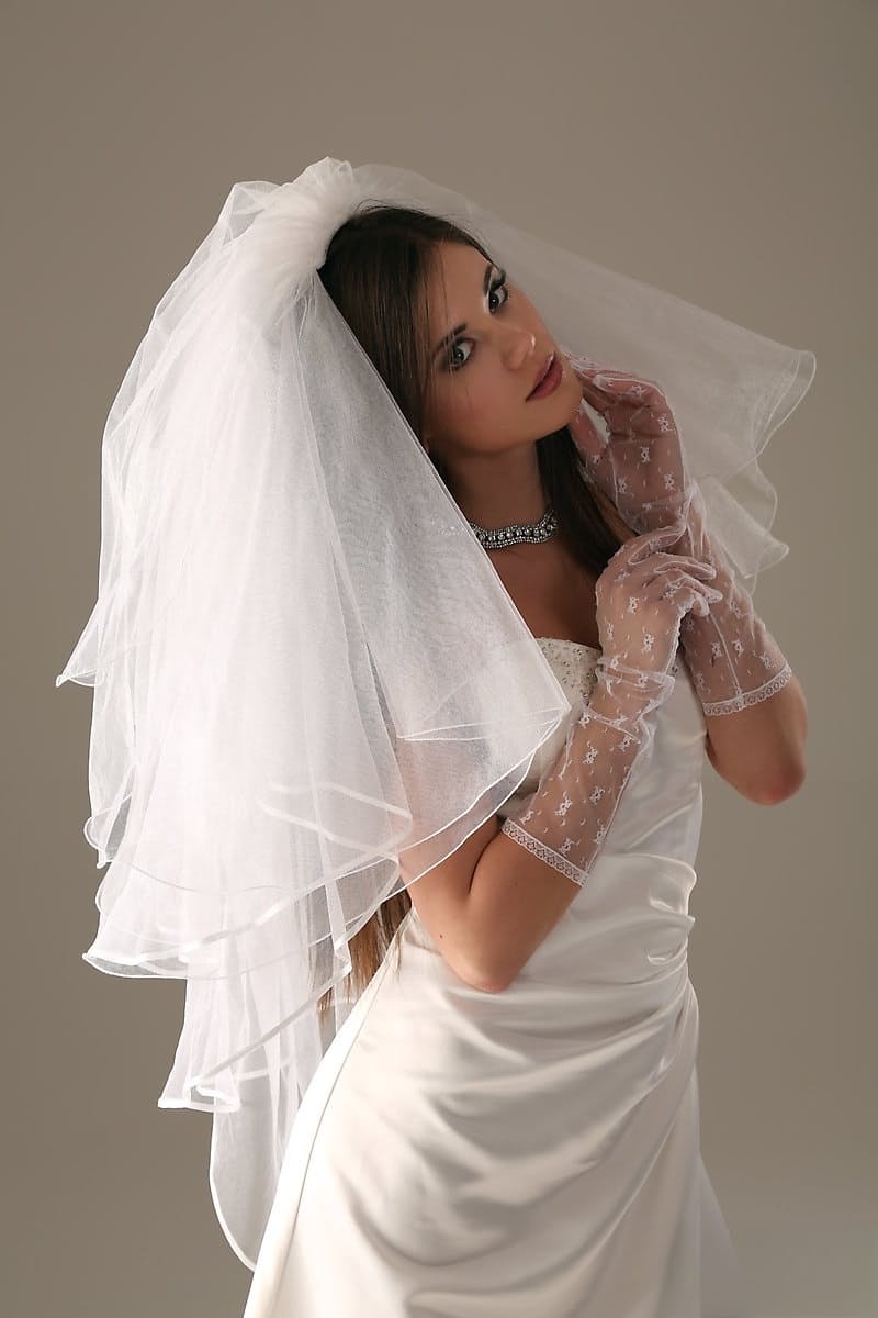 Glamour model Little Caprice strips off her wedding dress