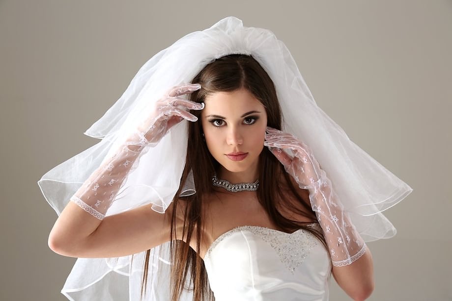 Glamour model Little Caprice strips off her wedding dress