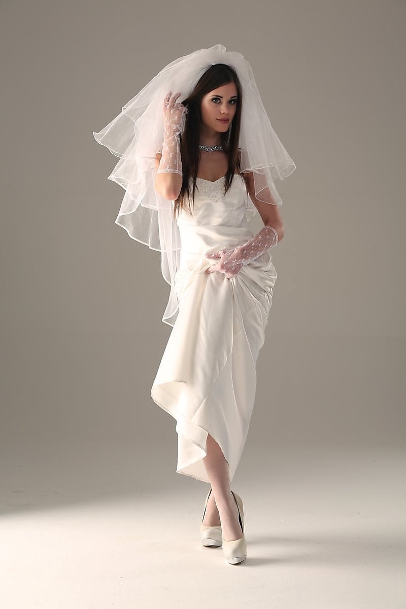Glamour model Little Caprice strips off her wedding dress
