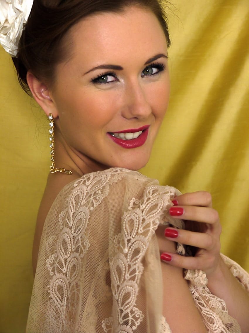British pinup model strips to her granny panties and nylons