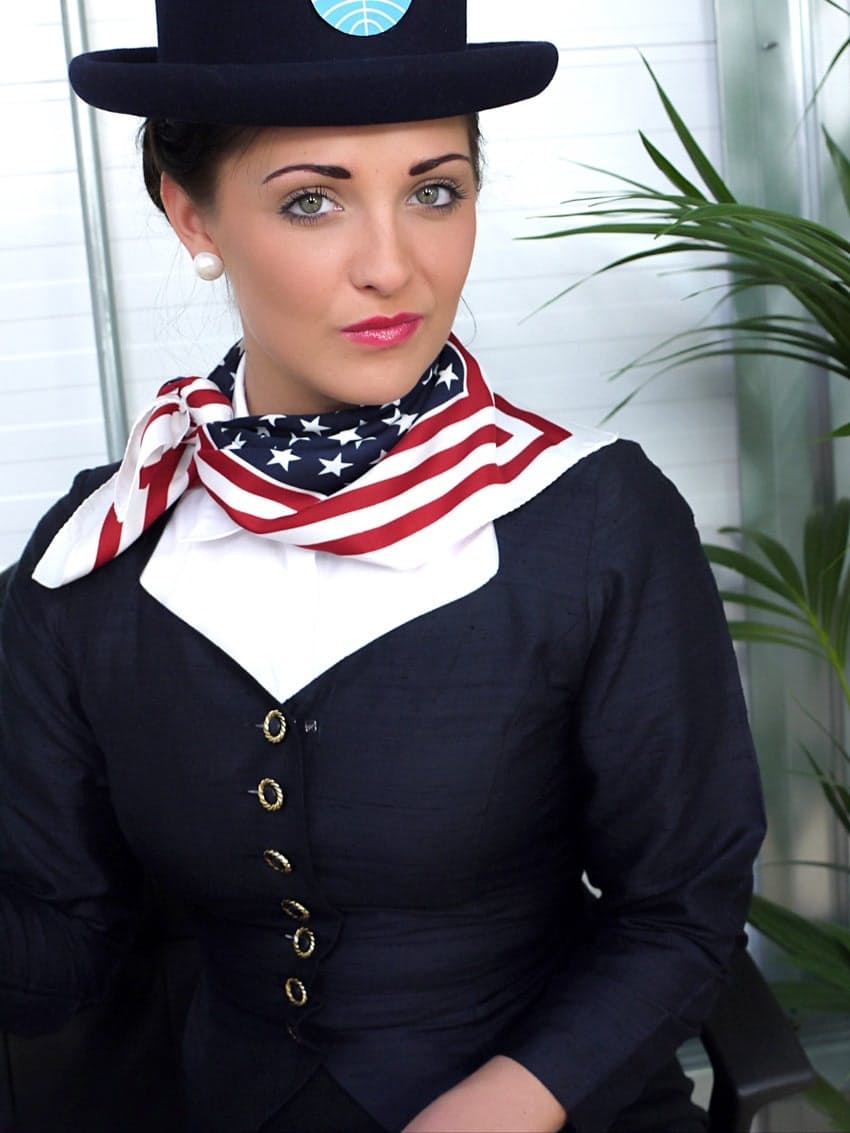 Hot air hostess strips down to her exotic stockings and red panties at work