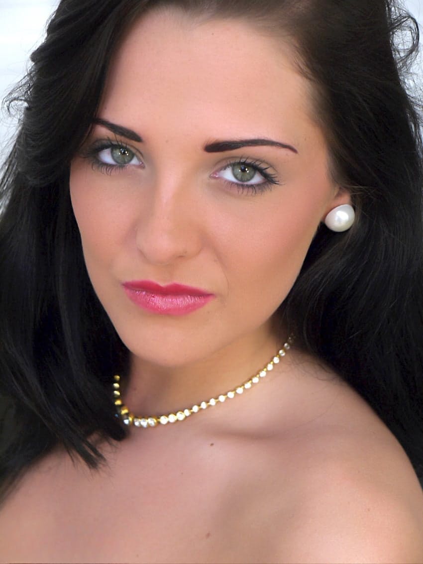 Hot air hostess strips down to her exotic stockings and red panties at work