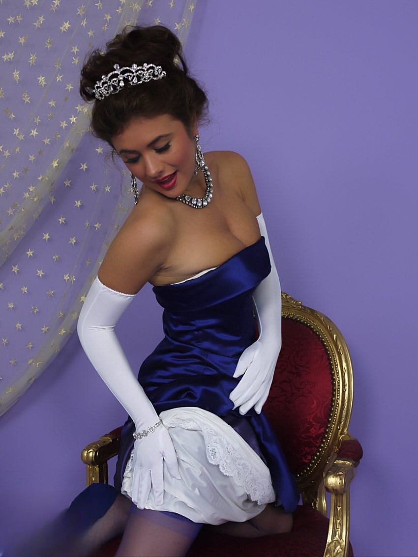 Prom queen Kelly Hall undresses to her vintage undies after accepting crown