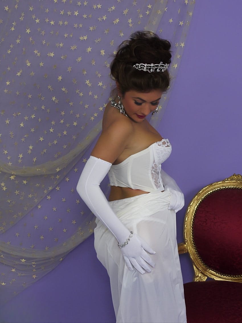 Prom queen Kelly Hall undresses to her vintage undies after accepting crown