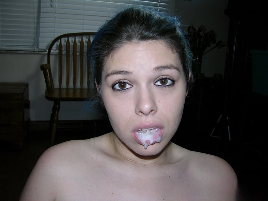 Teen girl with dyed hair spills cum from her mouth after a POV blowjob