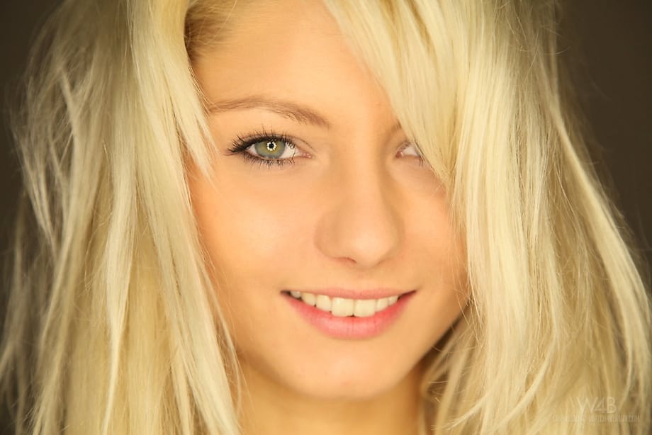 Blonde sexy teen Grace strips jeans to show perky tits and shaved pussy lips