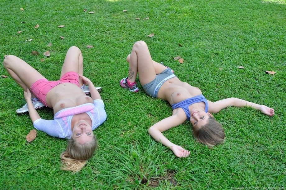 Fit lesbian girls flashing tits and ass outdoors on public street