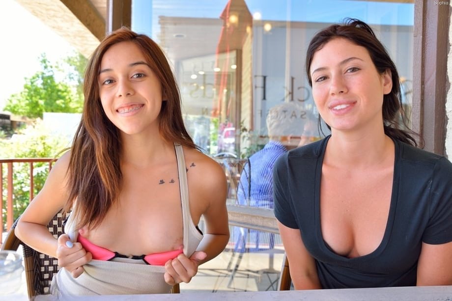 Barely legal lesbians with perky tits insert cucumbers into horny cunts