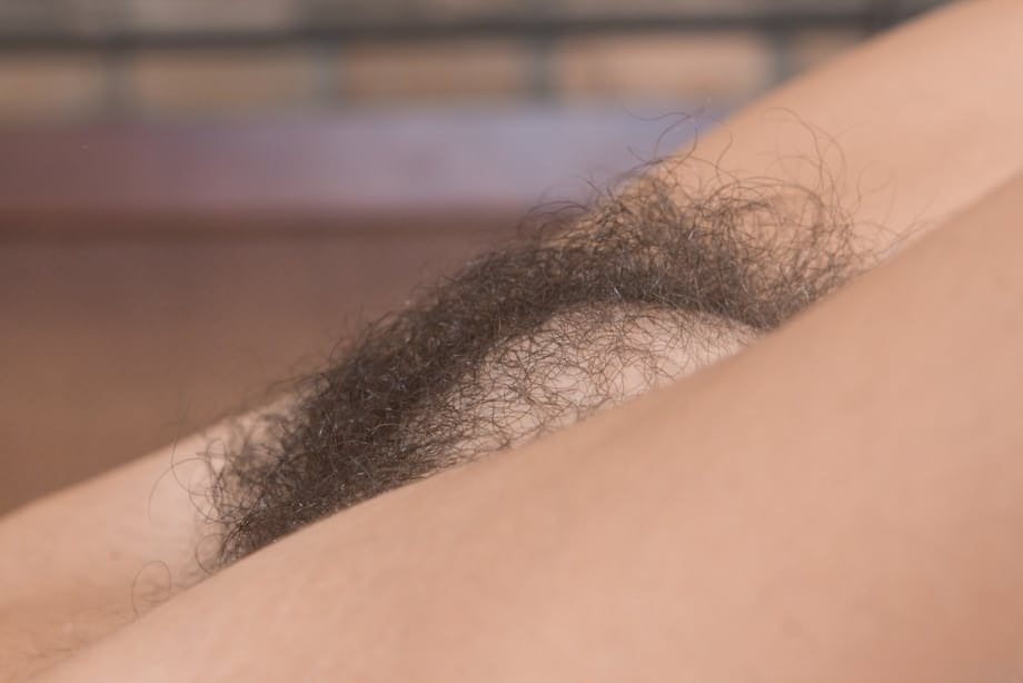 Pretty brunette Pavla undressing to spread & show hairy teen beaver close up