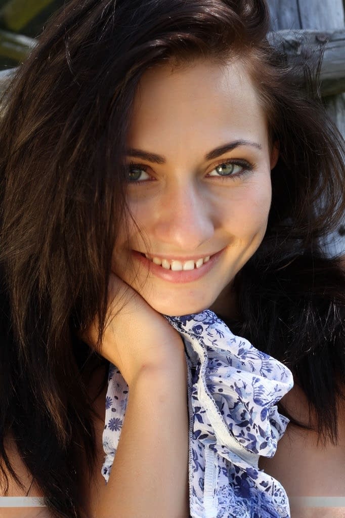 Leggy teen solo girl Michaela Isizzu flashing white upskirt panties outside