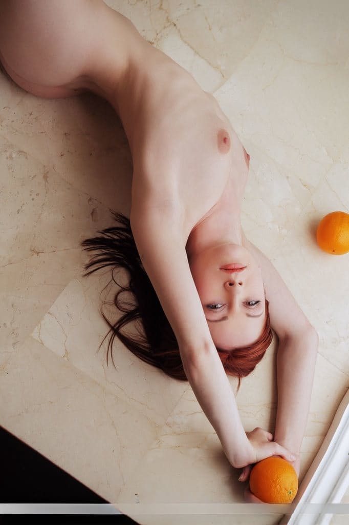 Pale redhead Night A in lace lingerie spreading long legs in bald twat closeup