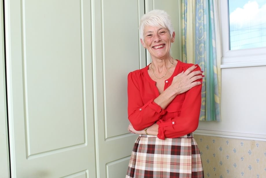 Over 70 Bristish granny takes off her clothes and lingerie striptease style