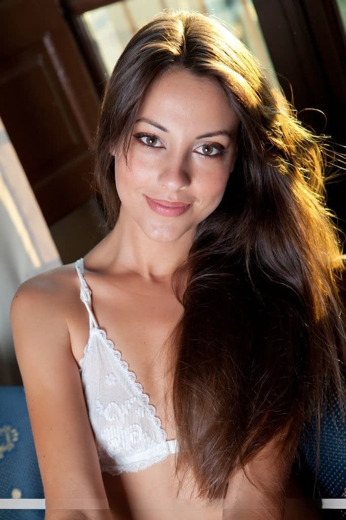 Leggy brunette babe Lorena B spreading hairy teen pussy after panty removal