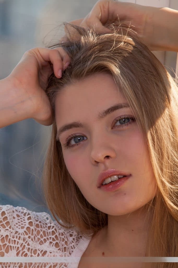 Adorable blonde sweetheart Sigrid unveils her cleanly shaved muff