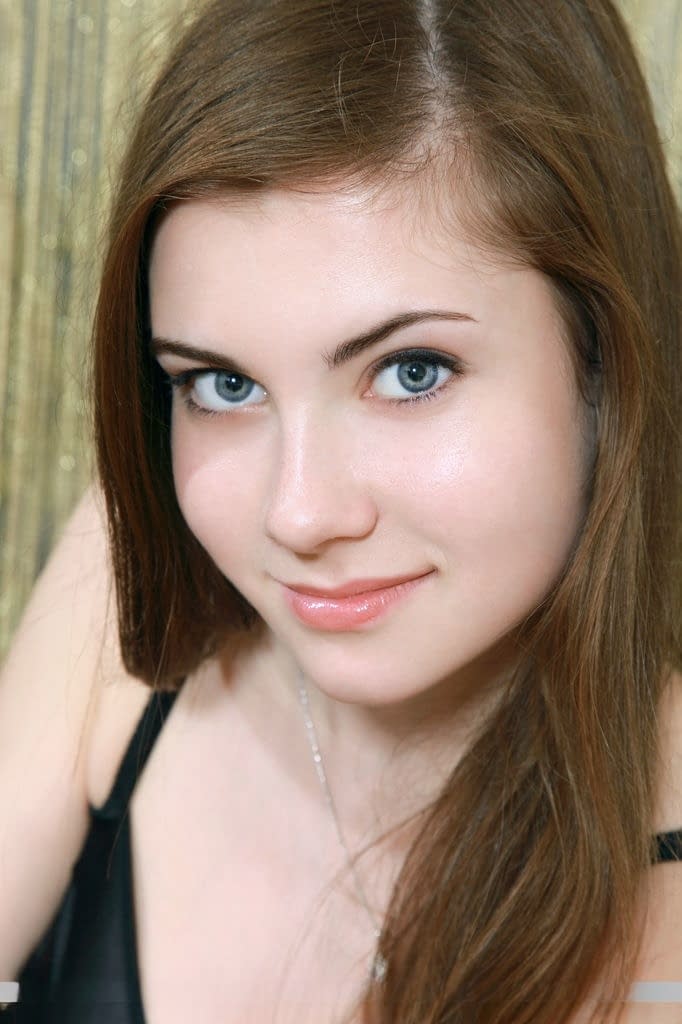 Glamourous Euro teen Marta E revealing full all natural teen breasts