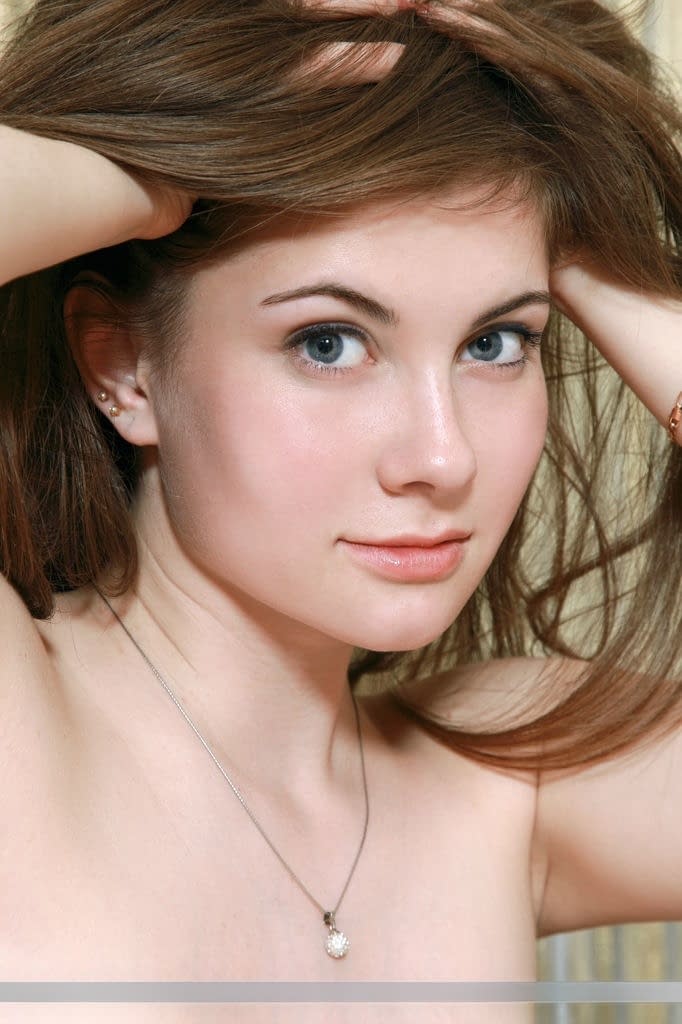 Glamourous Euro teen Marta E revealing full all natural teen breasts