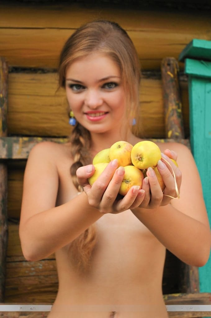 Beautiful petite teen Bridgit uncovers her dripping wet pussy