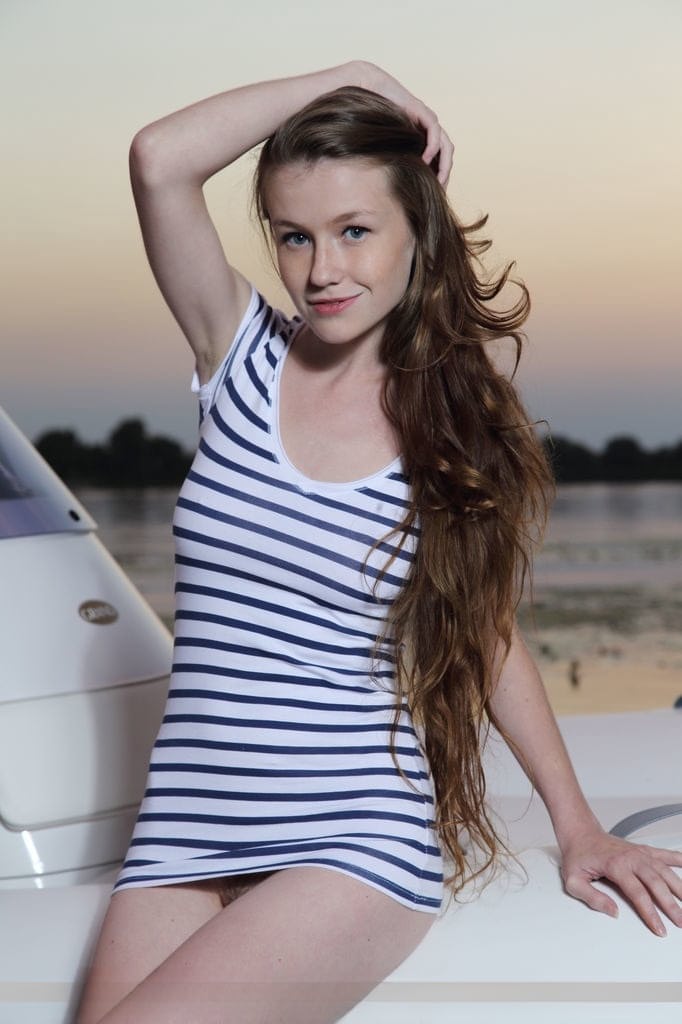 Wild teen Emily Bloom stripping at the lake to expose hairy pussy & nice tits