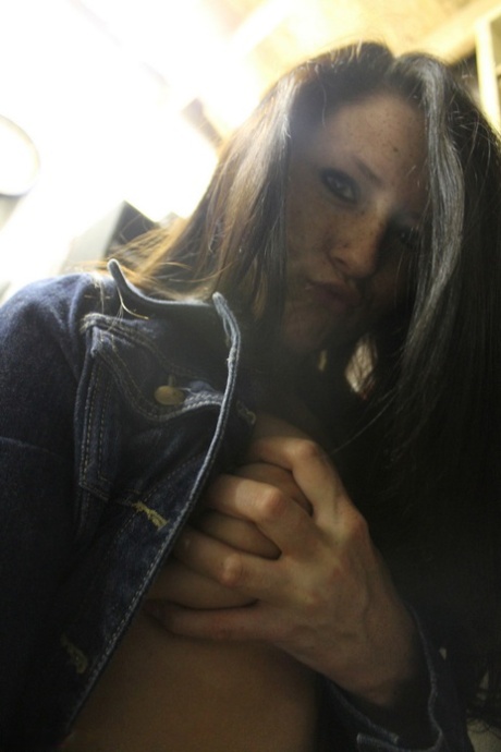 Amateur brunette Freckles takes some hot selfies of her perfect breasts
