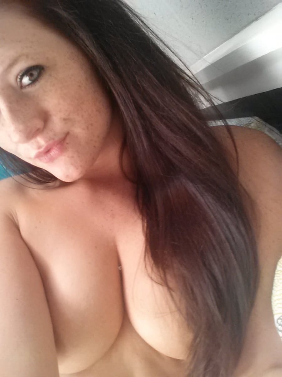 Self shot of brunette amateur Freckles showing cameltoe in sheer panties